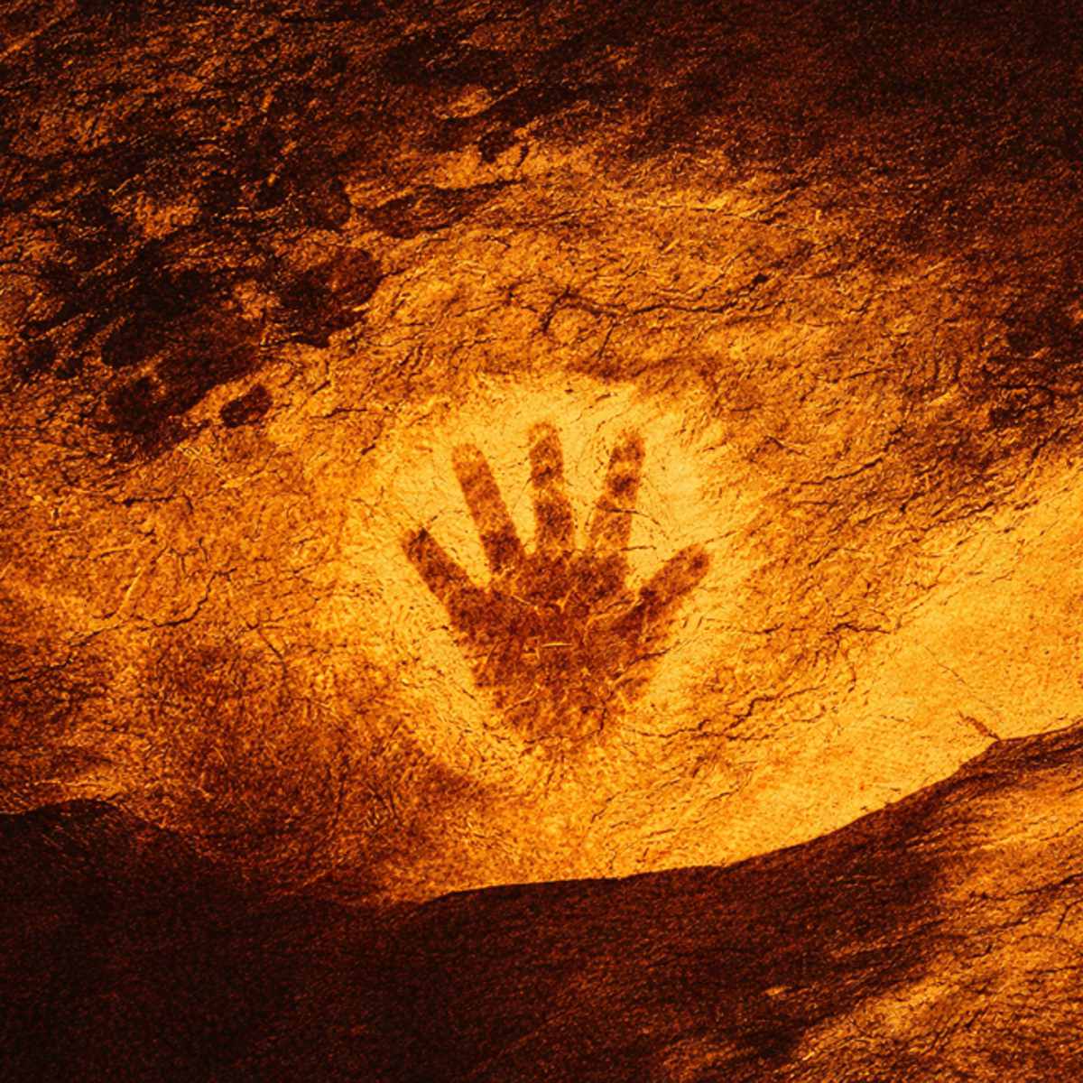 impressão de palma humana em parede de caverna